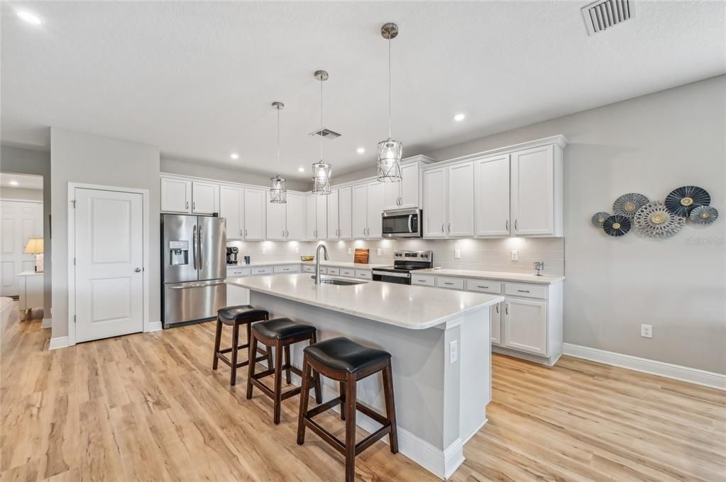 BEAUTIFUL OPEN KITCHEN WITH LARGE ISLAND COUNTER