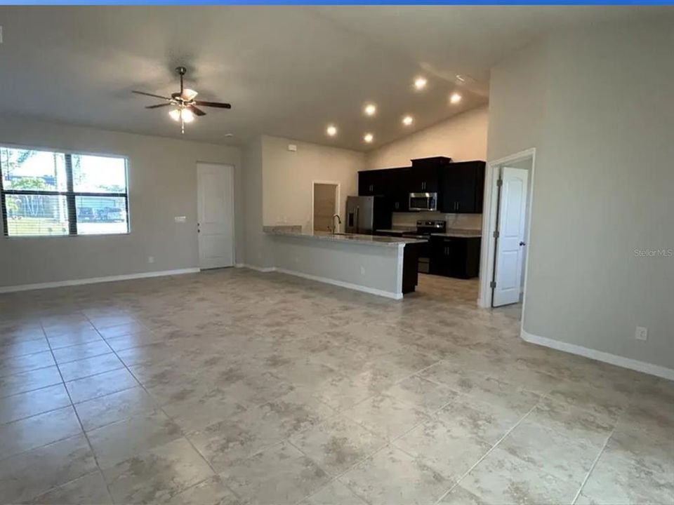 Front door and kitchen