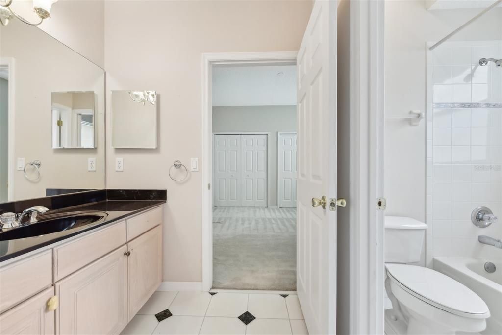 Jack and Jill Bathroom with Water Closet Separate from Vanity