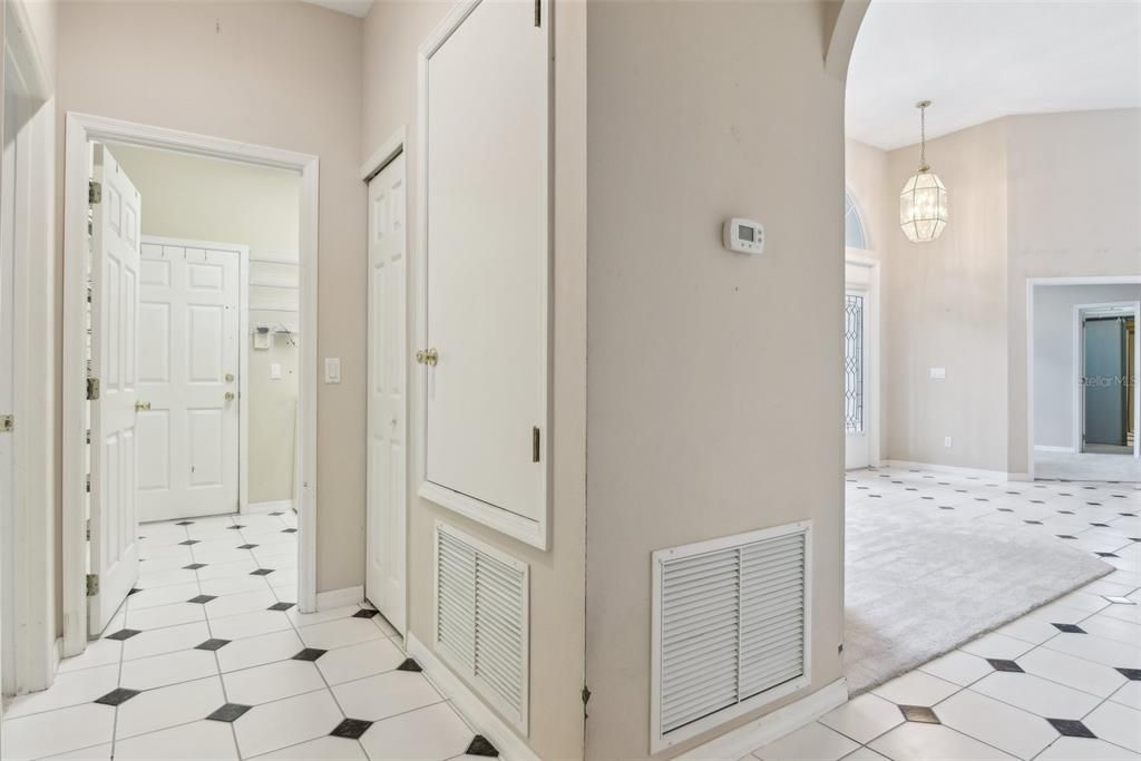 Hallway of 2nd and 3rd Bedroom that also leads to Laundry Room and Garage