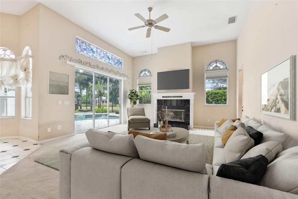 Main Family Room with SO MUCH NATURAL LIGHT. 13 FT CEILINGS!