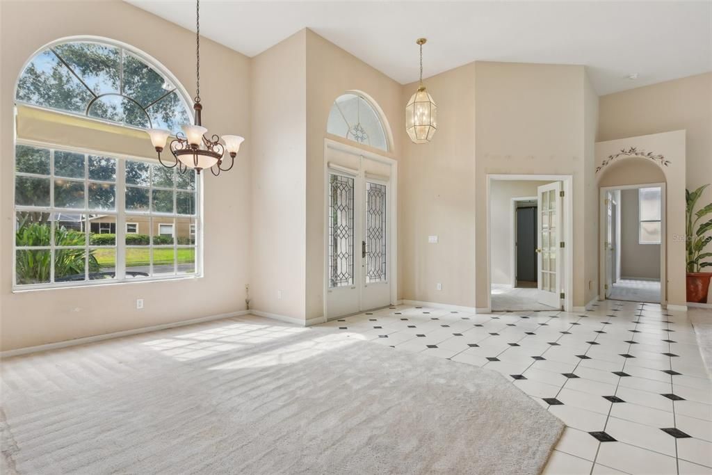 Formal Dining, Foyer, Office and Primary Bedroom Entrance. 13 FT CEILINGS!