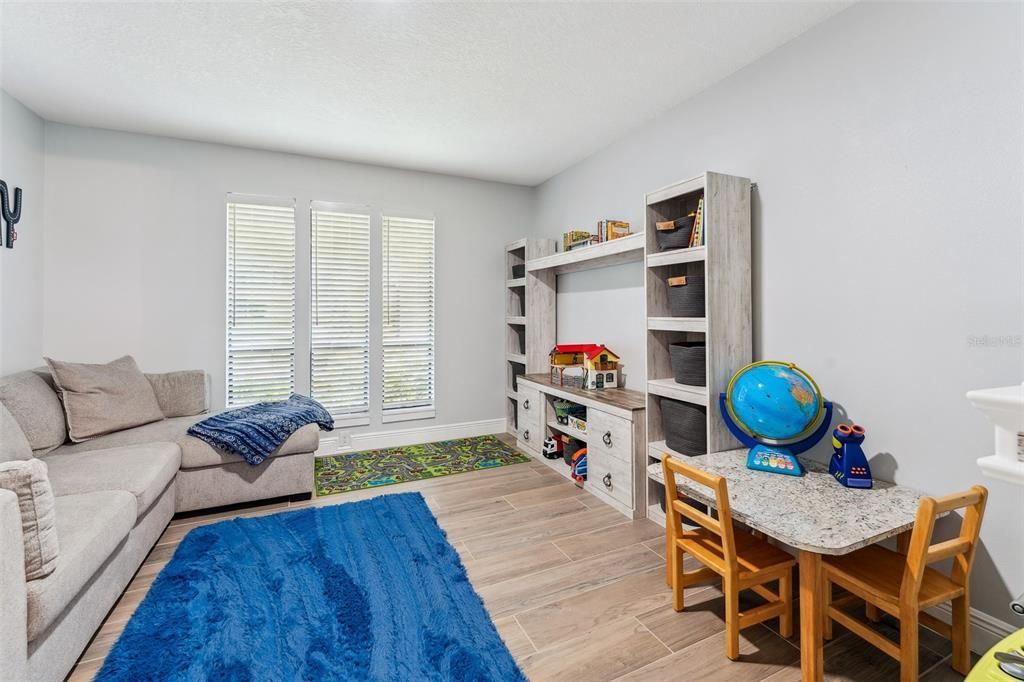 Separate Office /Den/ Playroom/excercise right off the kitchen.