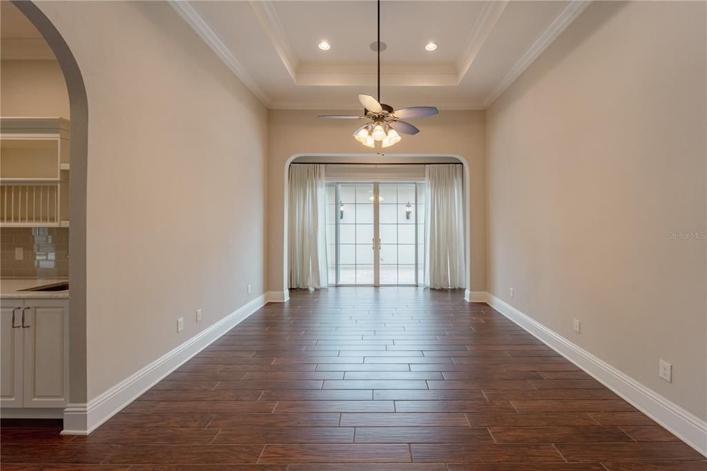 The dining room has an entrance to the private courtyard.