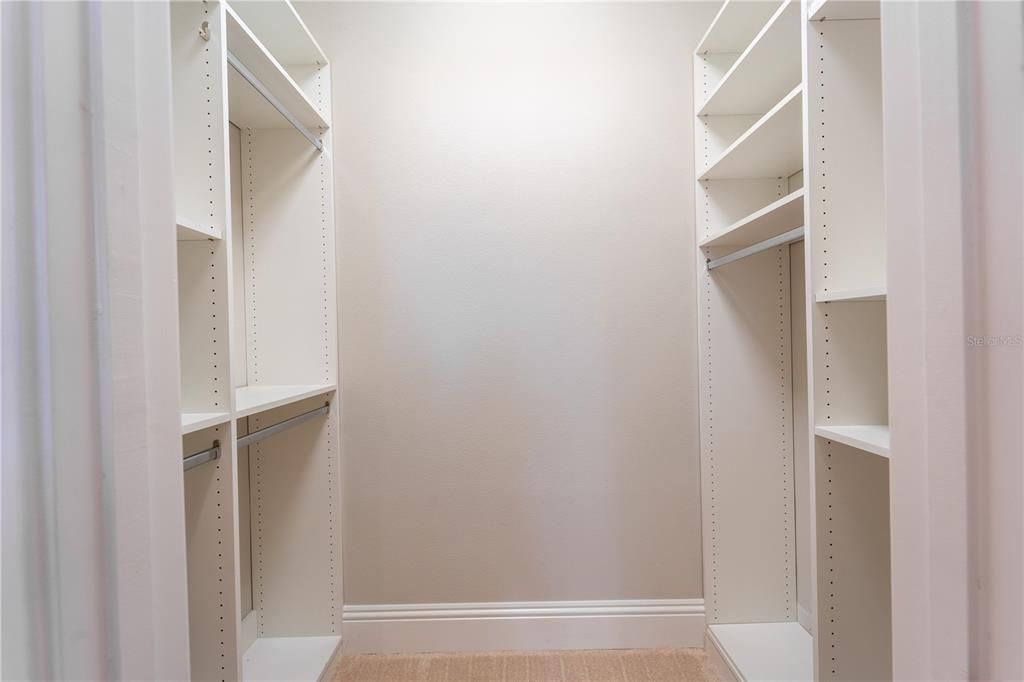 The walk in closet of bedroom 3.