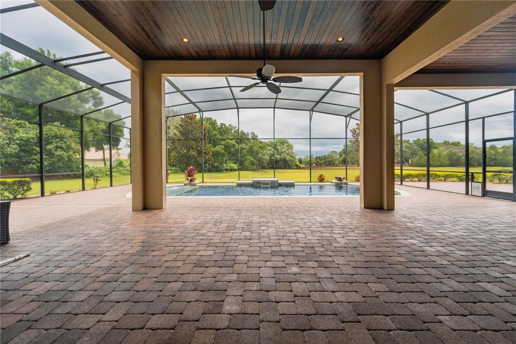The spacious back porch and lanai is ready for your entertaining needs.