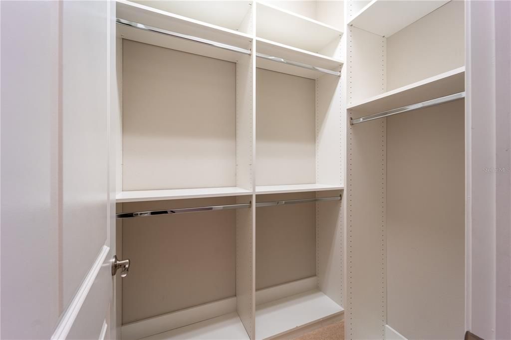 The large walk in closet of the front bedroom.