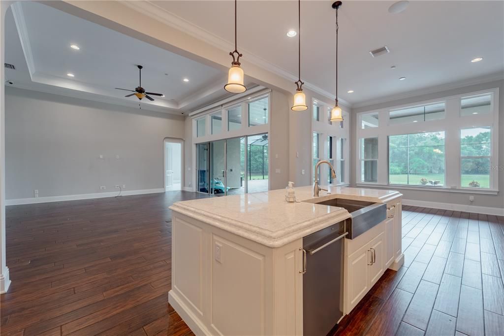 The breakfast nook is right off the kitchen overlooking the pool area.