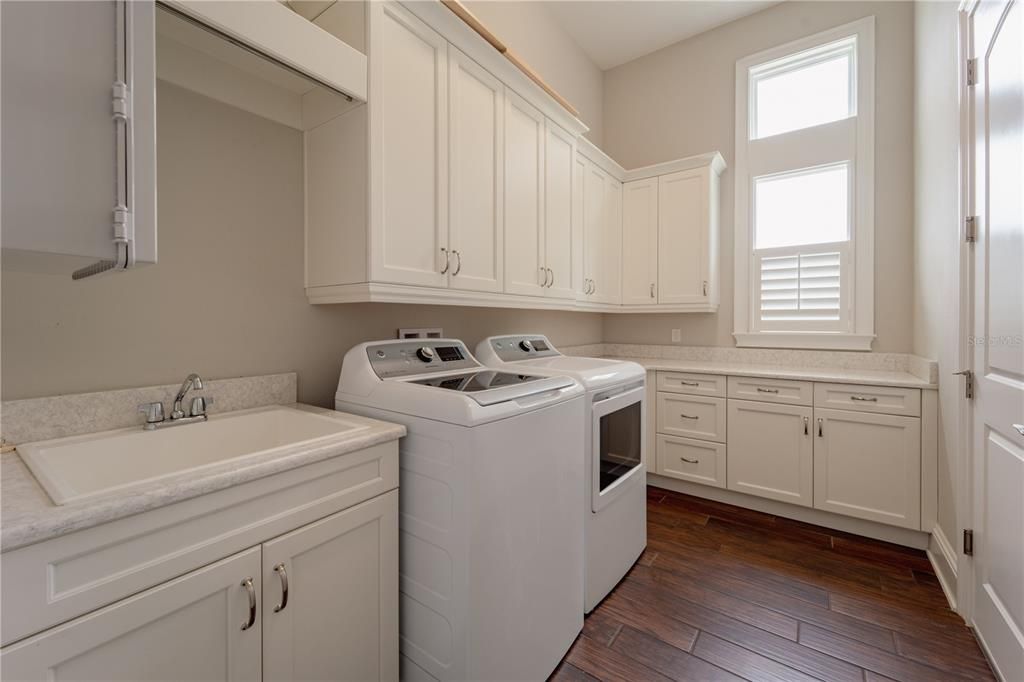 The large laundry room is behind the single car garage.