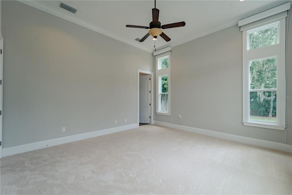 The bonus room has motorized window treatments.