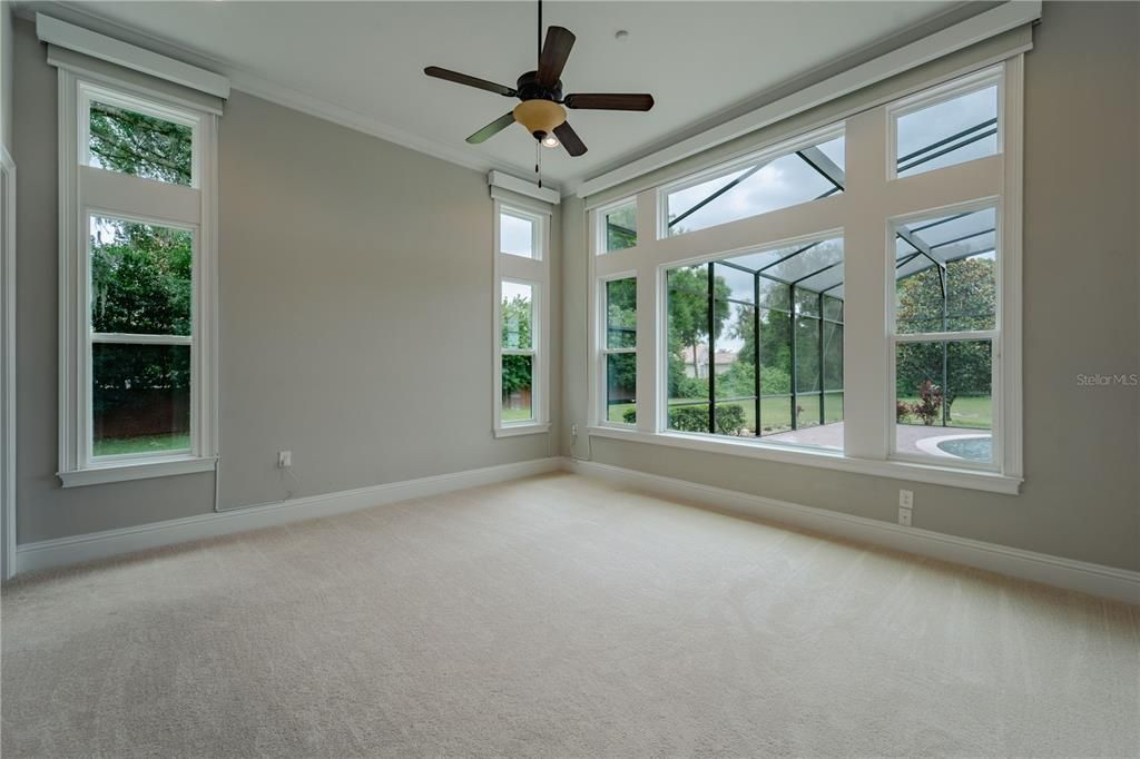 The bonus room looking out over the pool area.