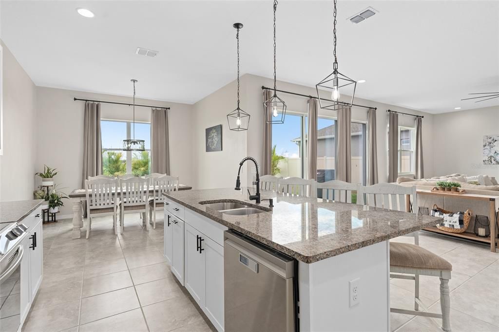 did you also notice the custom kitchen handles and look at all the natural light in this downstairs oasis!