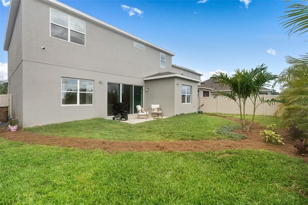 beautiful fenced in backyard