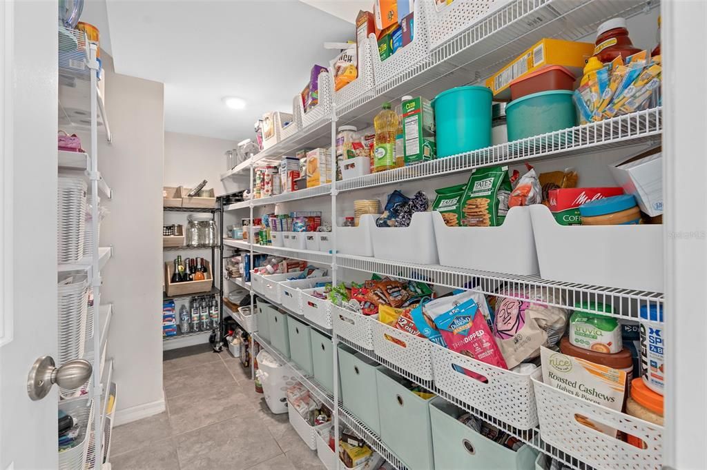 Oh yeah behind that door is an enormous pantry. You will have no problem stocking up anymore!