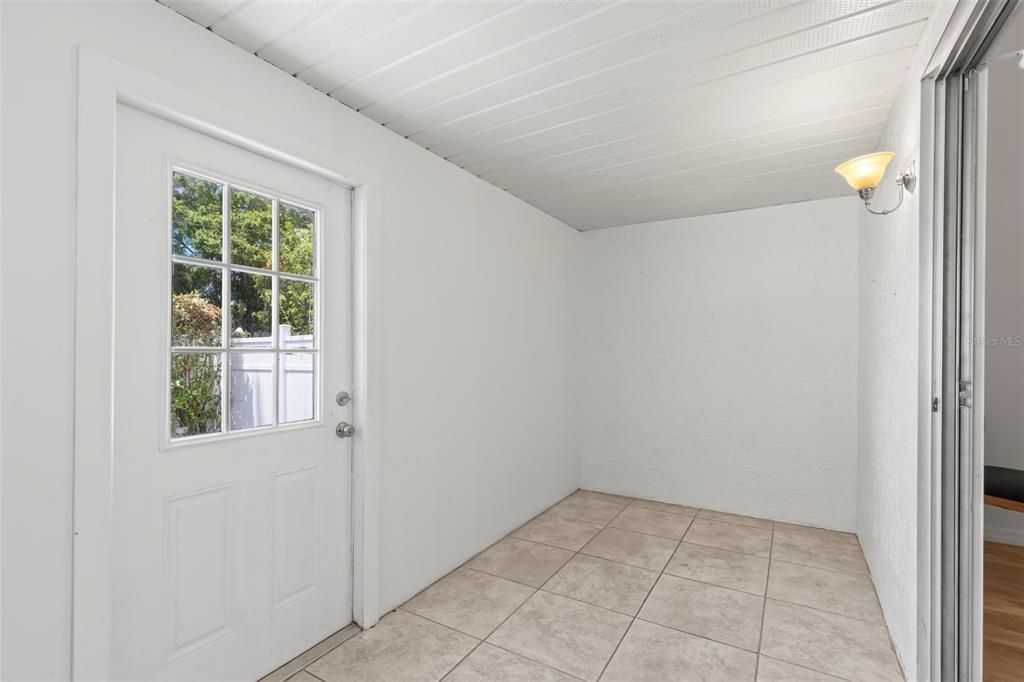 Laundry room with full size washer and dryer