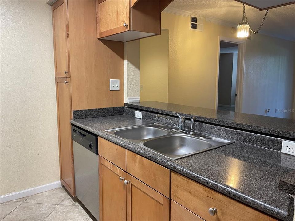 Galley kitchen with stainless steel