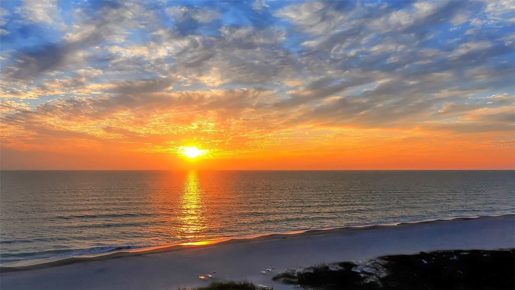 Sunset at Whispering Sands beach.