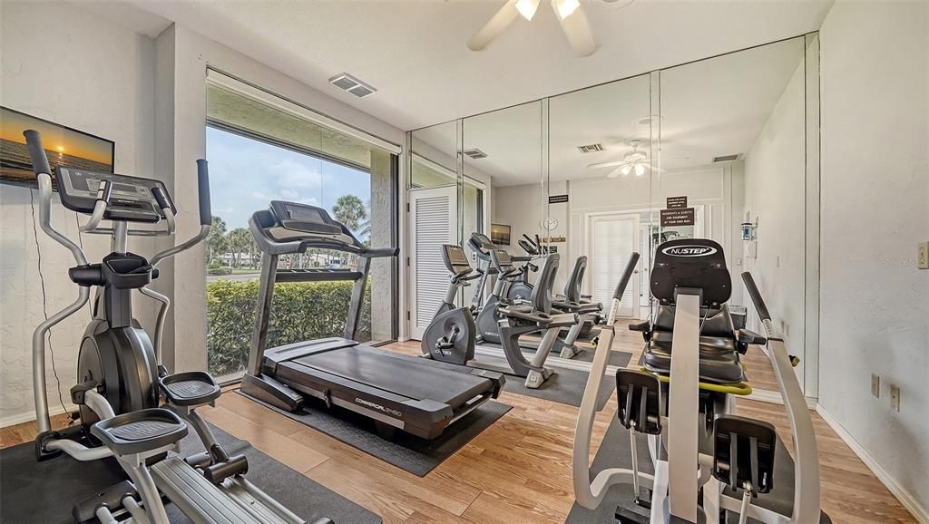 Aerobic fitness room in clubhouse.