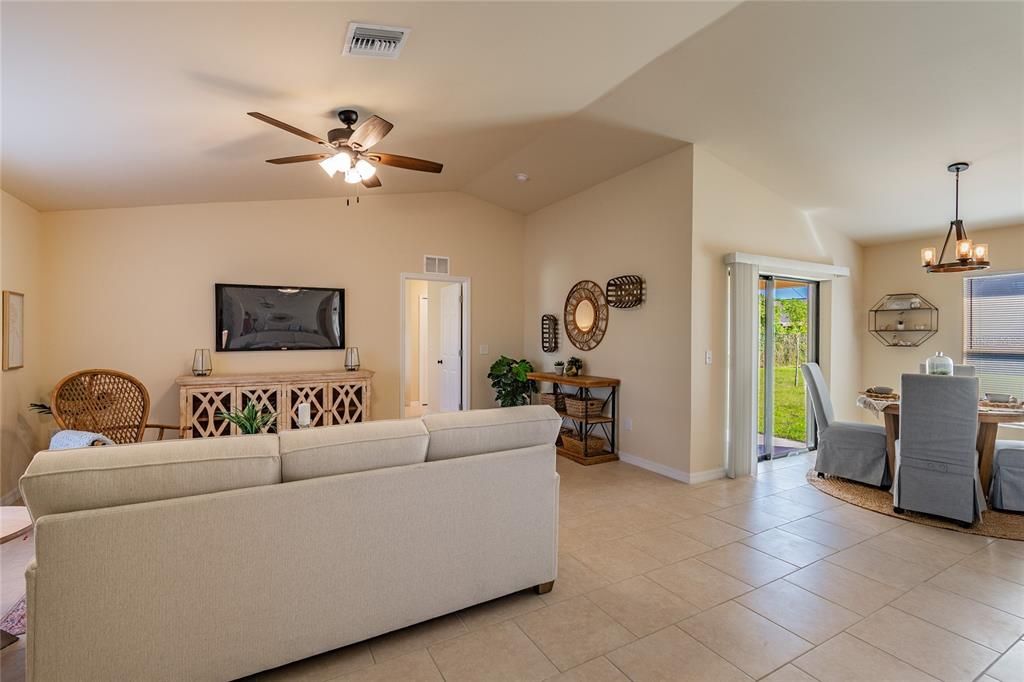 Digitally staged example of Dining & Living Area