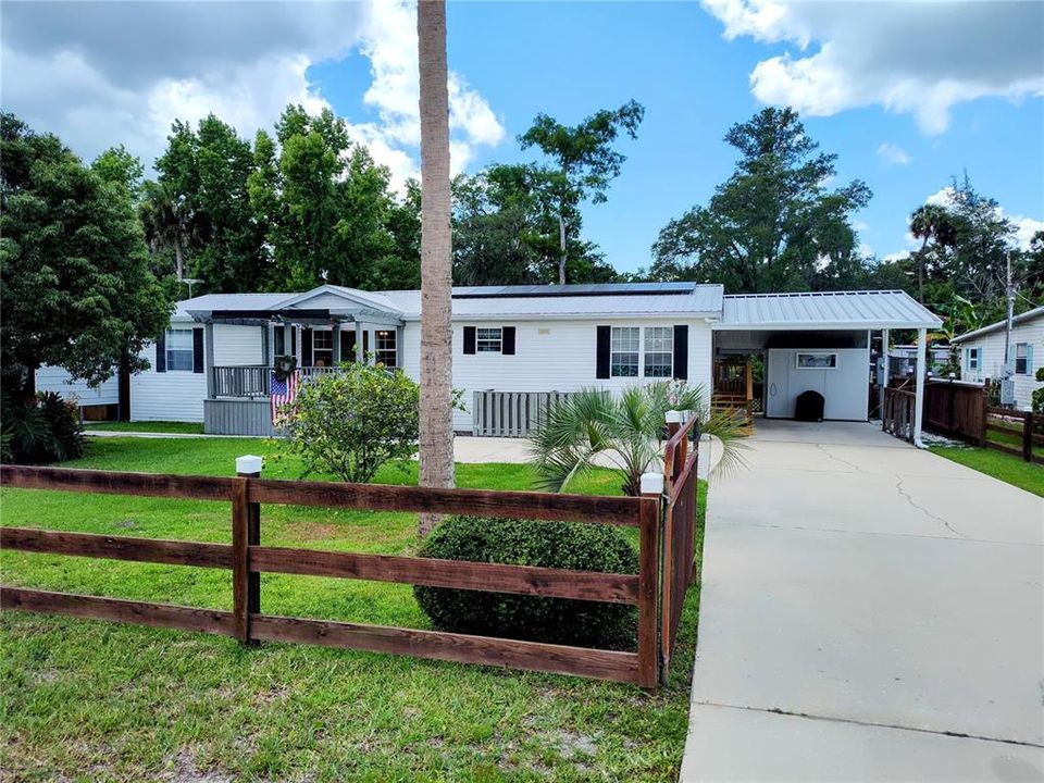 Driveway to first Carport