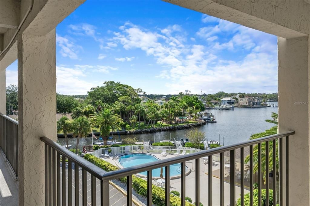 View of water/pool from front door