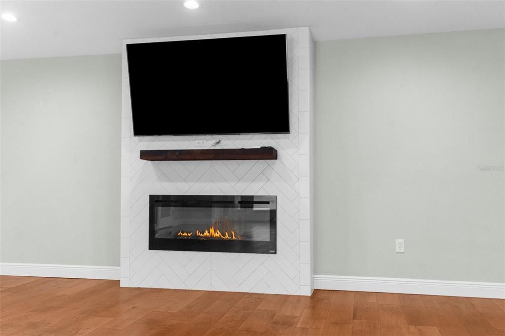 electric fire place with heat feature, all via remote.