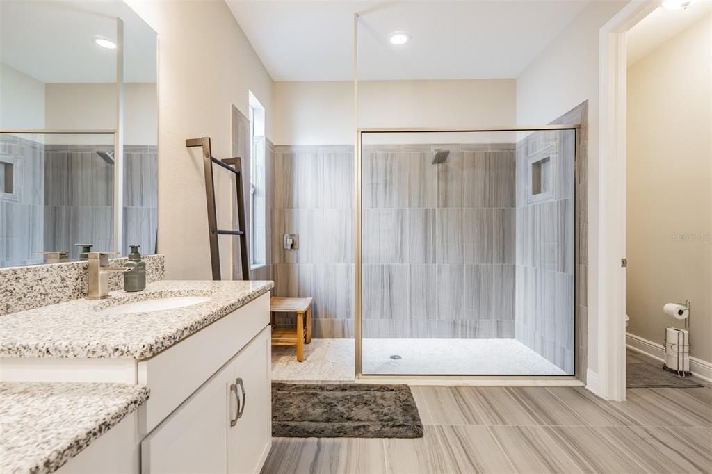 secondary primary suite bathroom on 1st floor