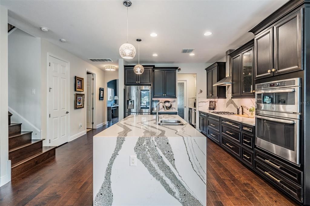 Beautiful quartz waterfall countertop on the island