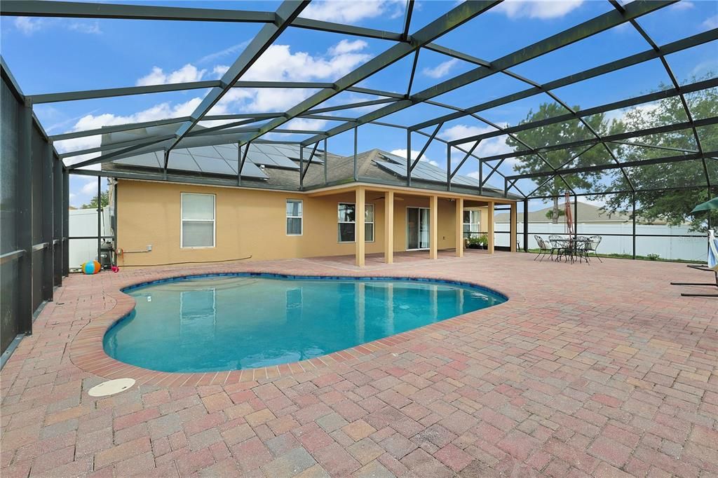 Screened in pool and patio area