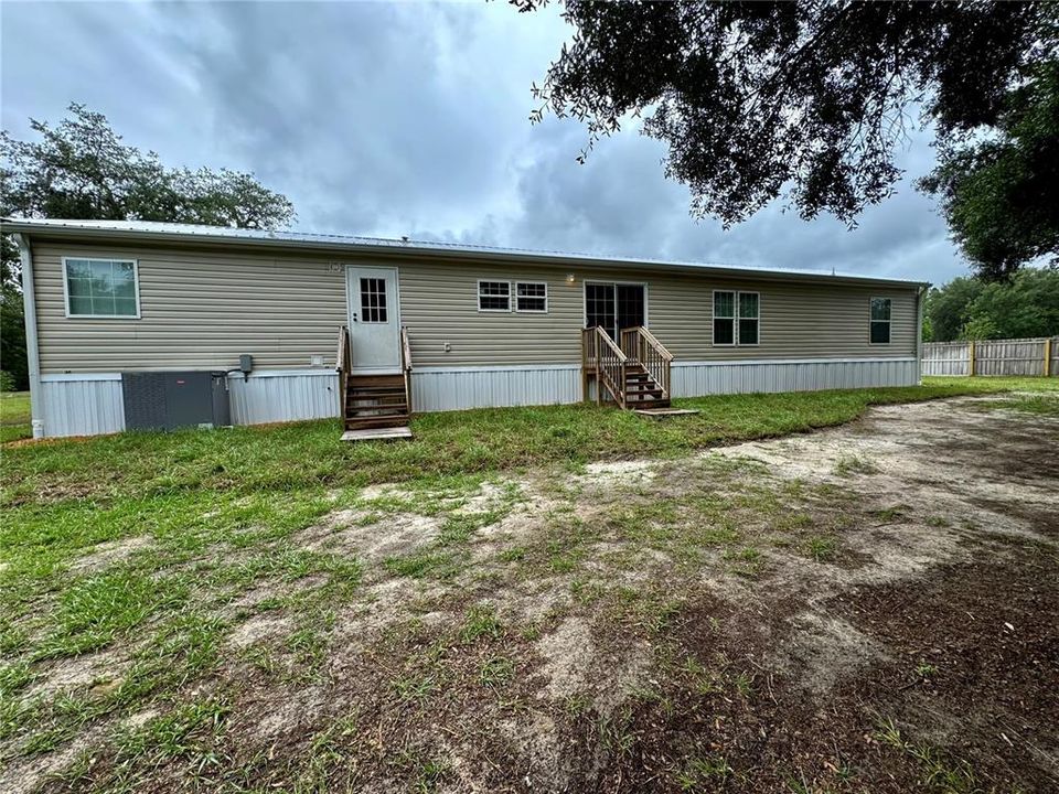 back porches, new sod around home