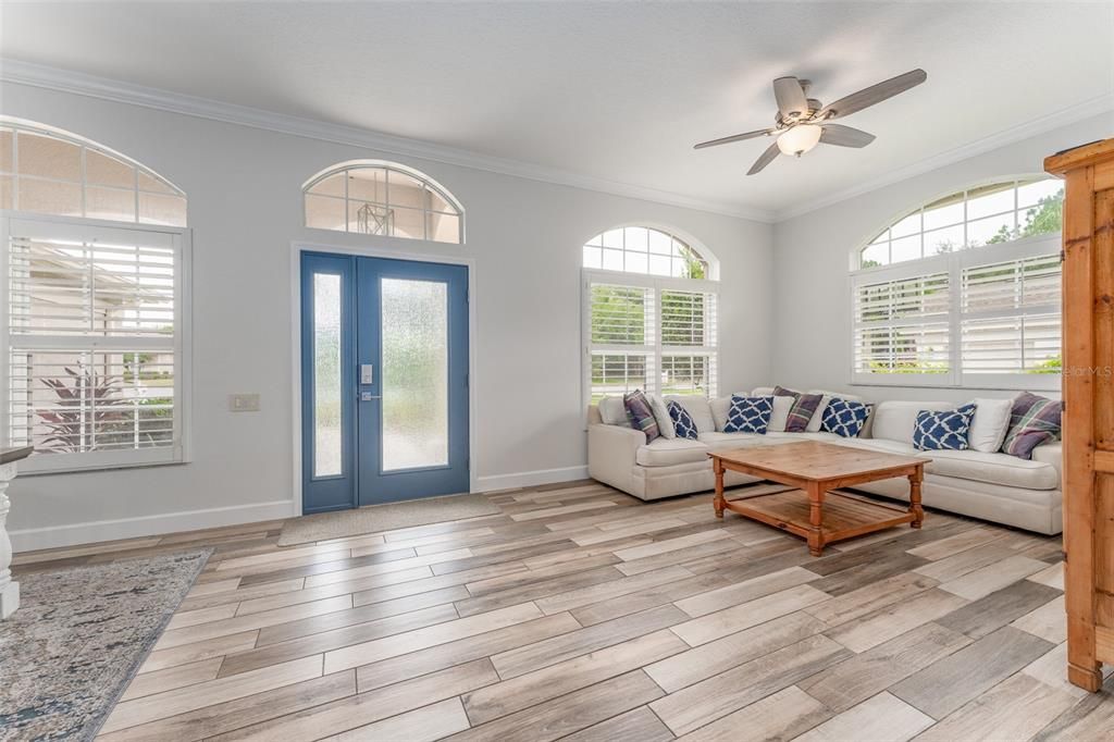 Front Entrance with More Formal Living & Dining Areas on Each Side