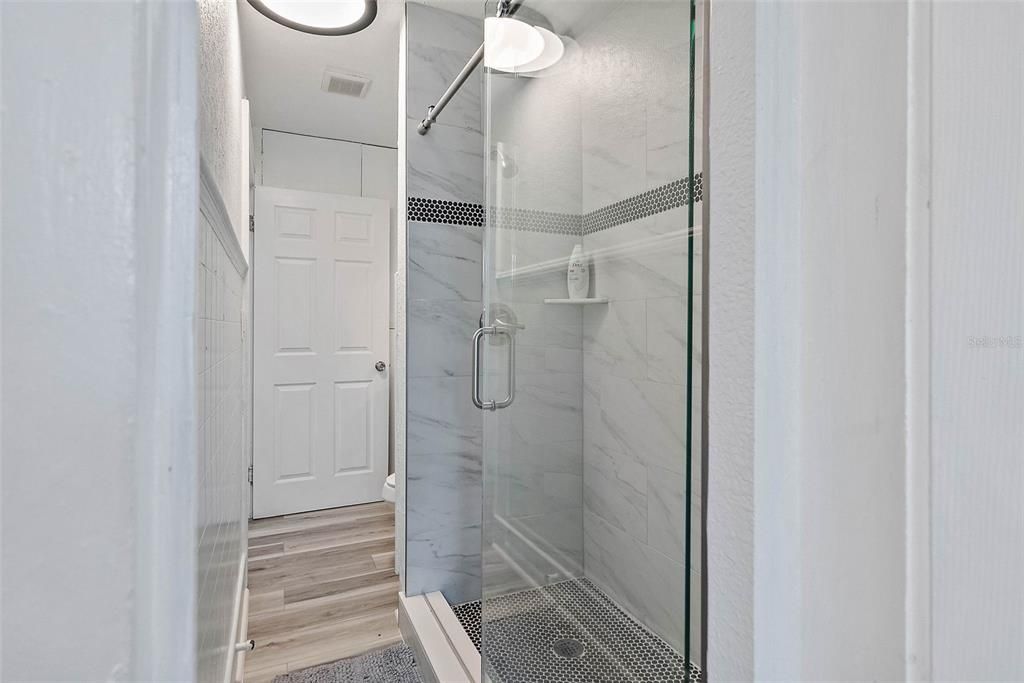 Unit B - Frameless shower