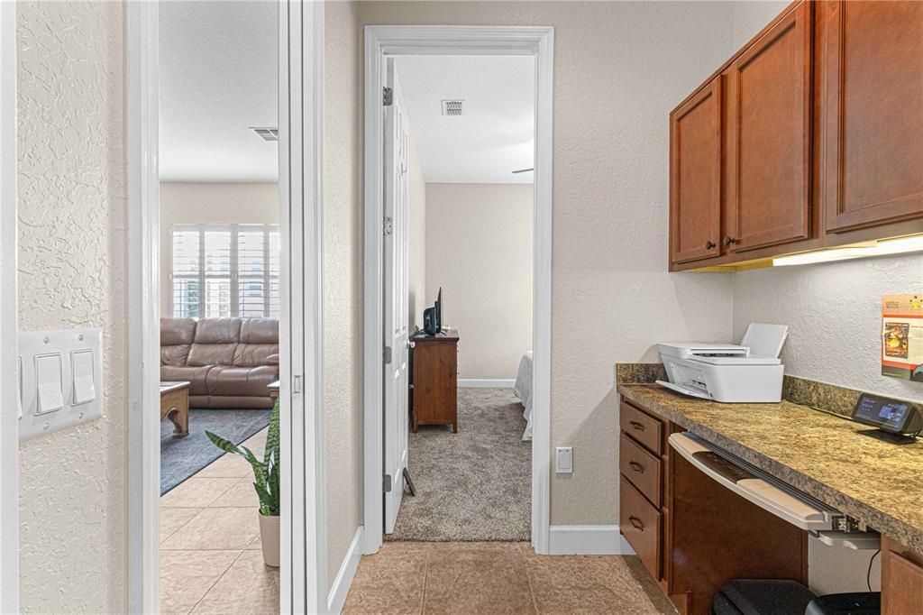 Built-In Desk and View of Living Room Leading to Guest Bedroom 3