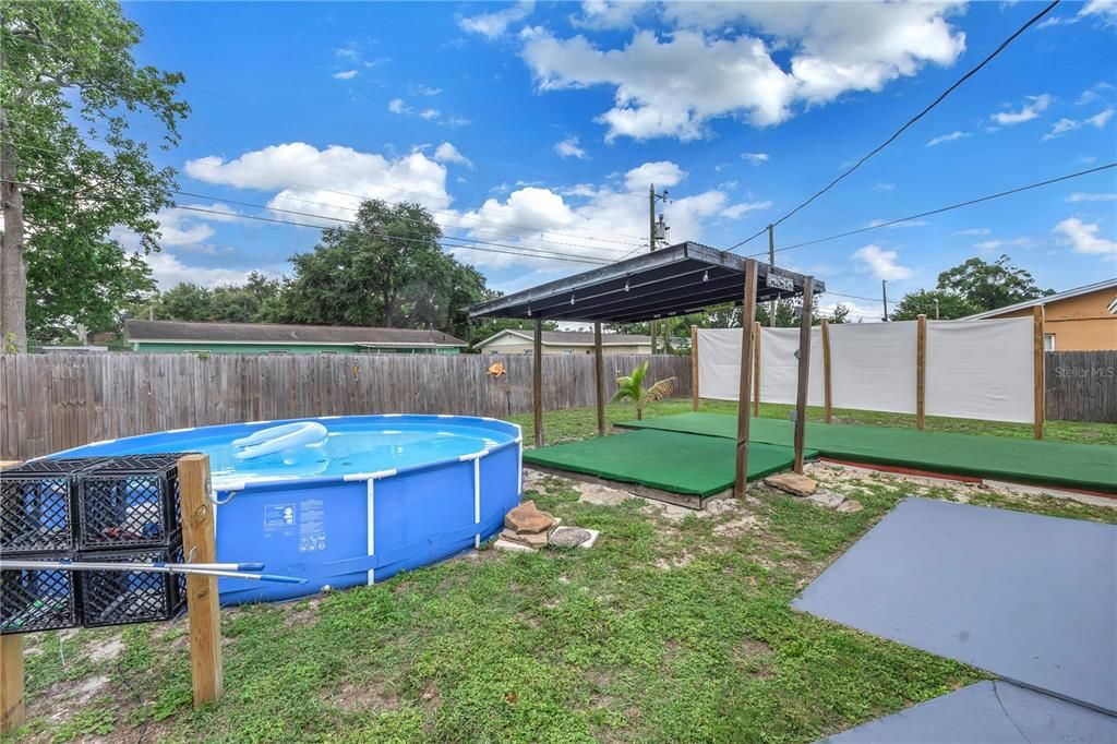 pool and privacy fenced backyard