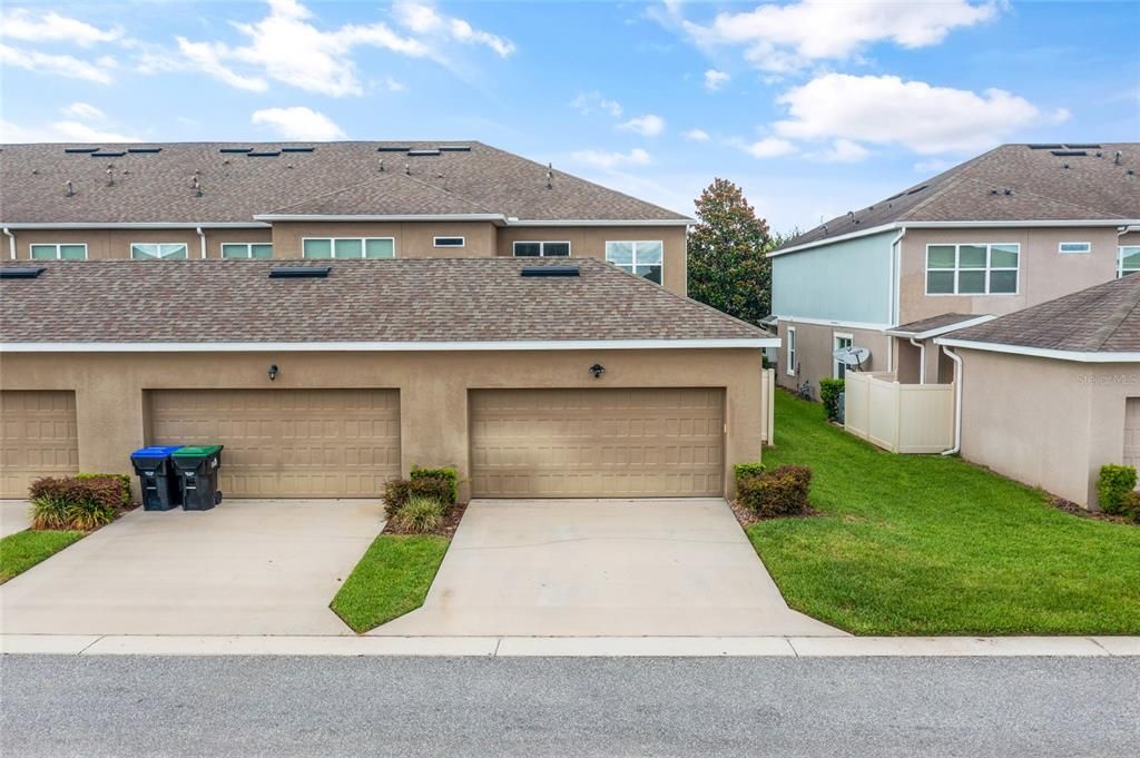 Front view of the property - great end unit and covered front porch area!