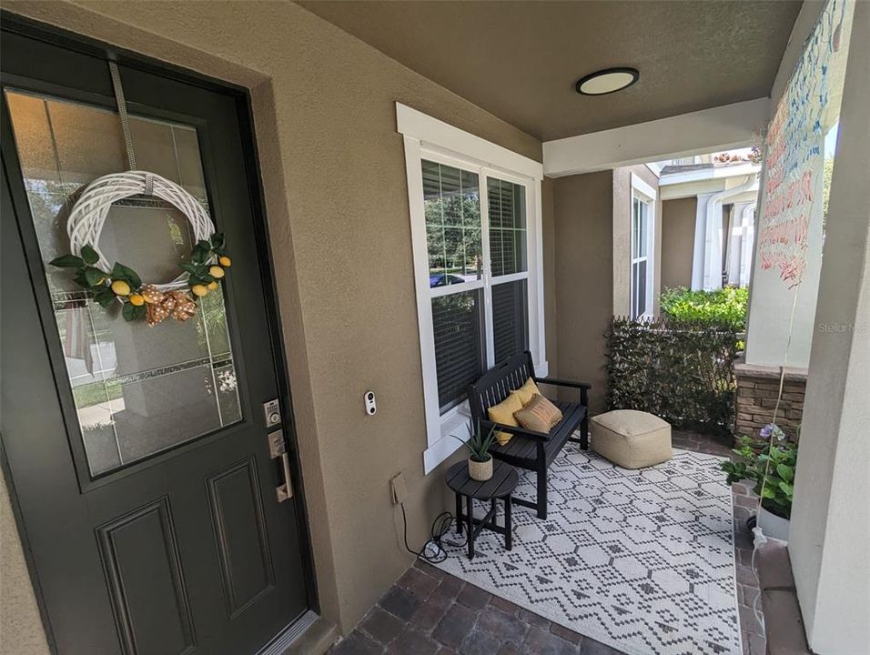 Great courtyard with full patio plus a covered walkway to the 2 car detached garage.