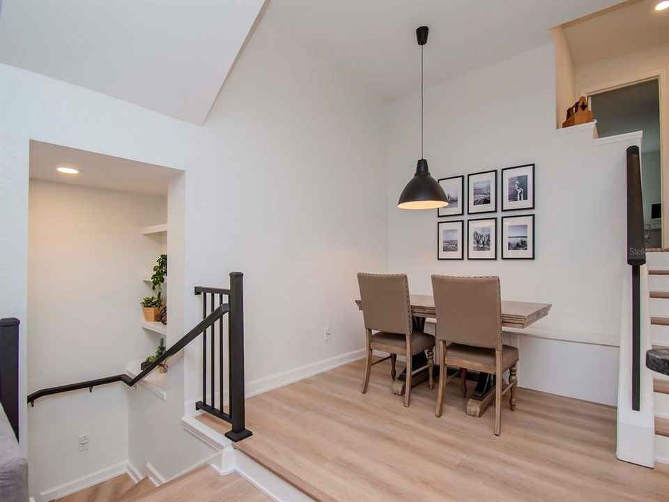 Dining area with built-in bench for seating and storage