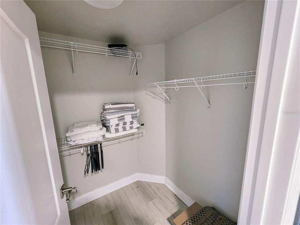 WALK IN CLOSET PRIMARY BEDROOM