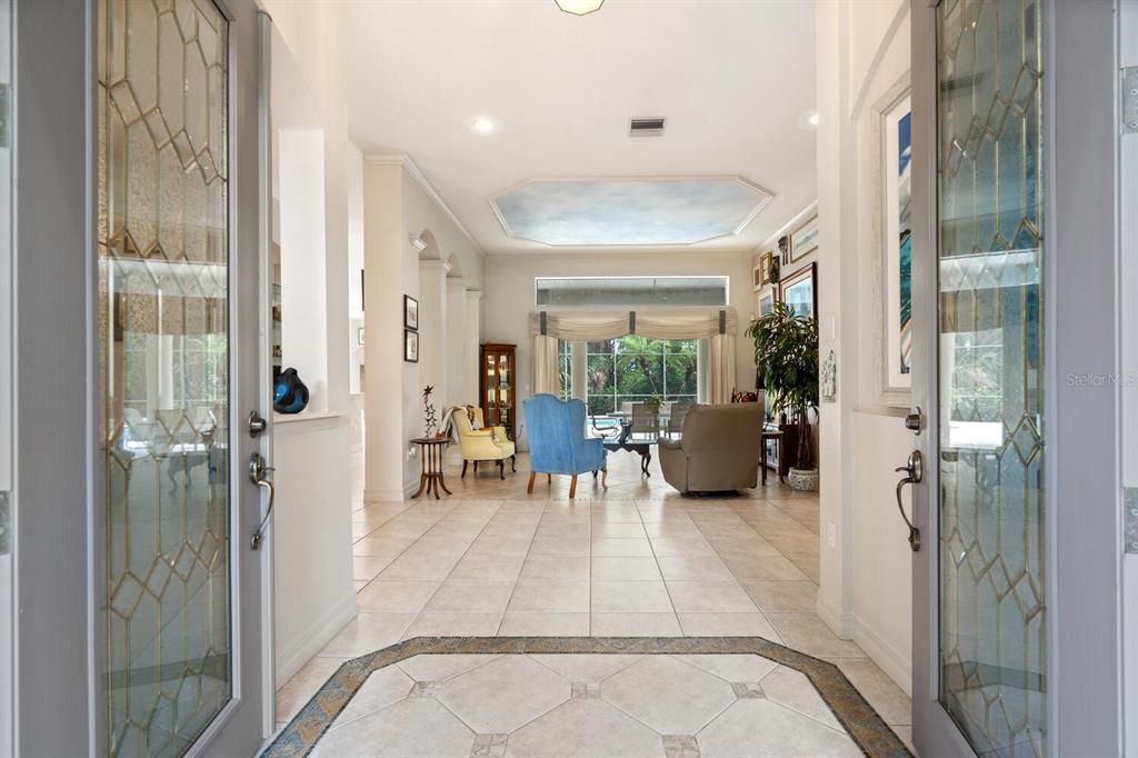 Foyer & Double Beveled Glass Front Doors to Living Room