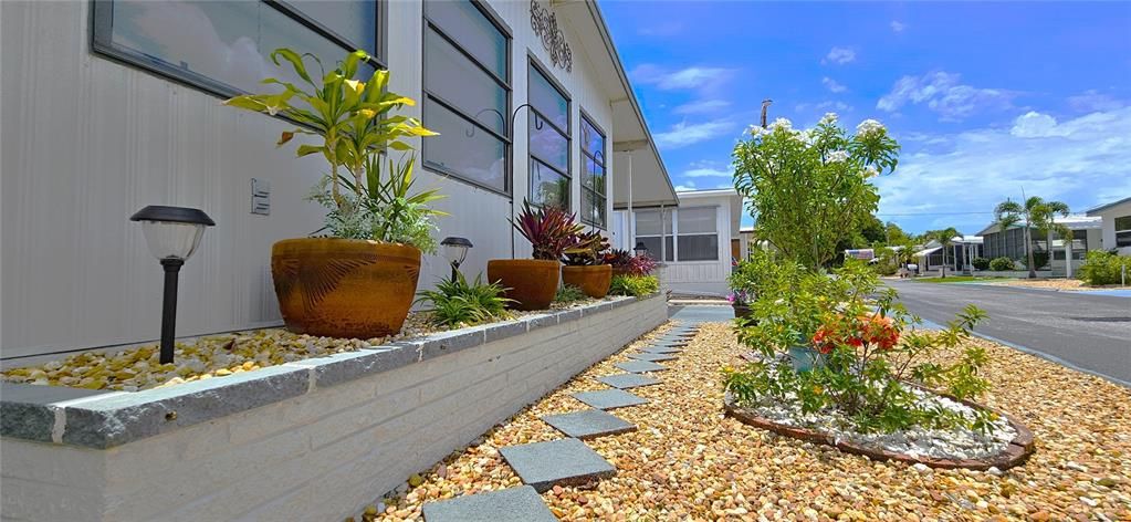 Gorgeous path & flower bed with a retaining wall