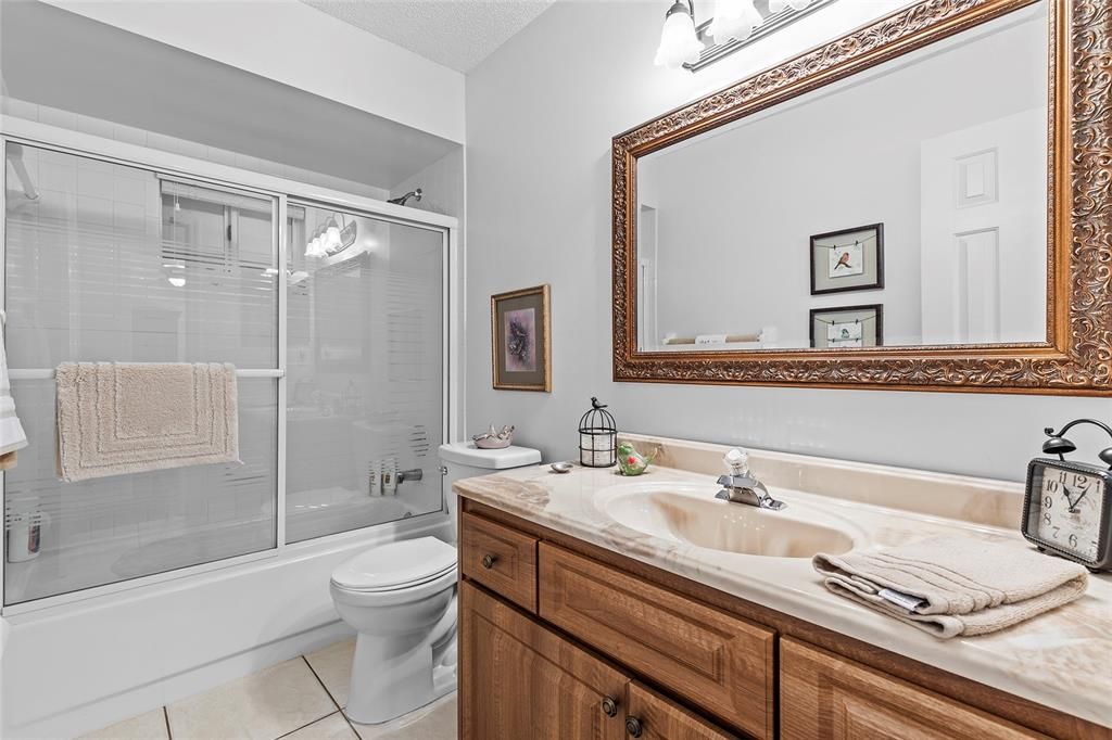 Guest bath with upgraded cabinets.