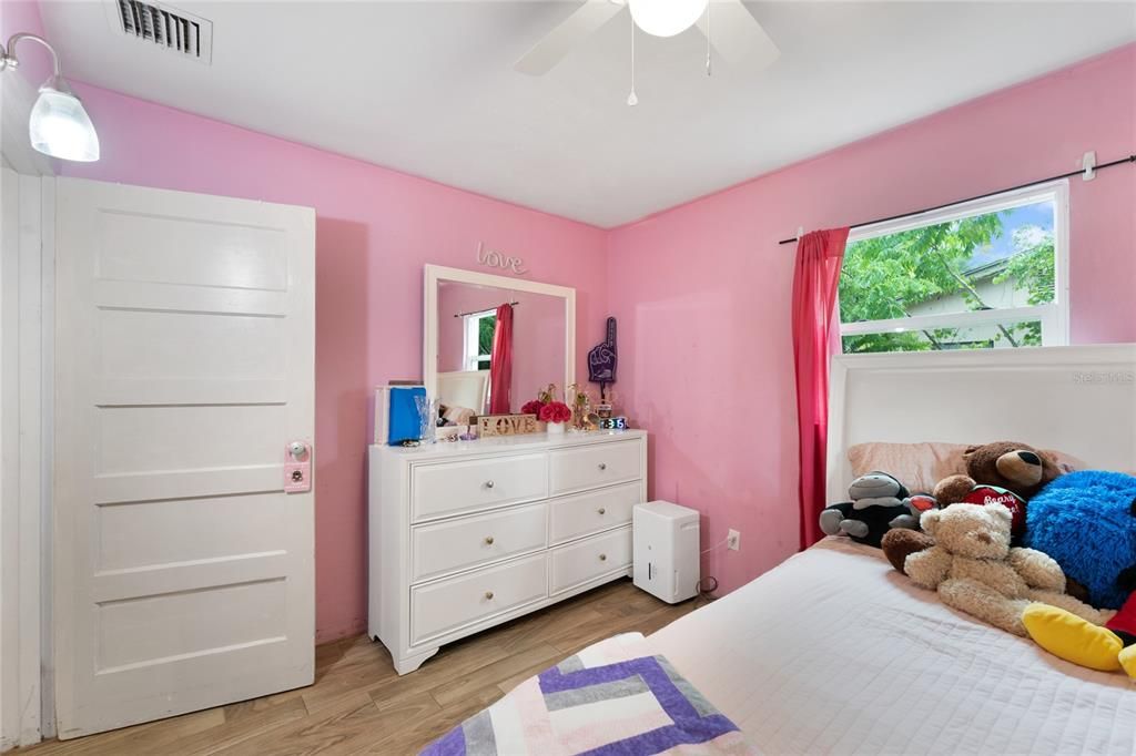 Tile Plank Flooring continues into the bedrooms