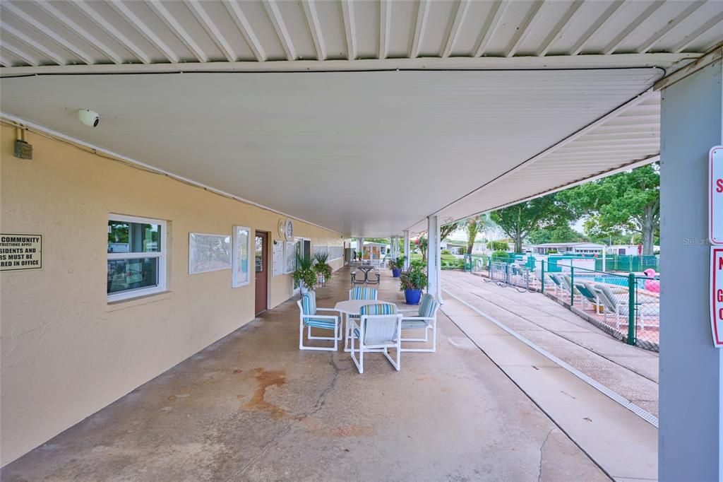 Patio at the community pool offers a wonderful place to gather and relax