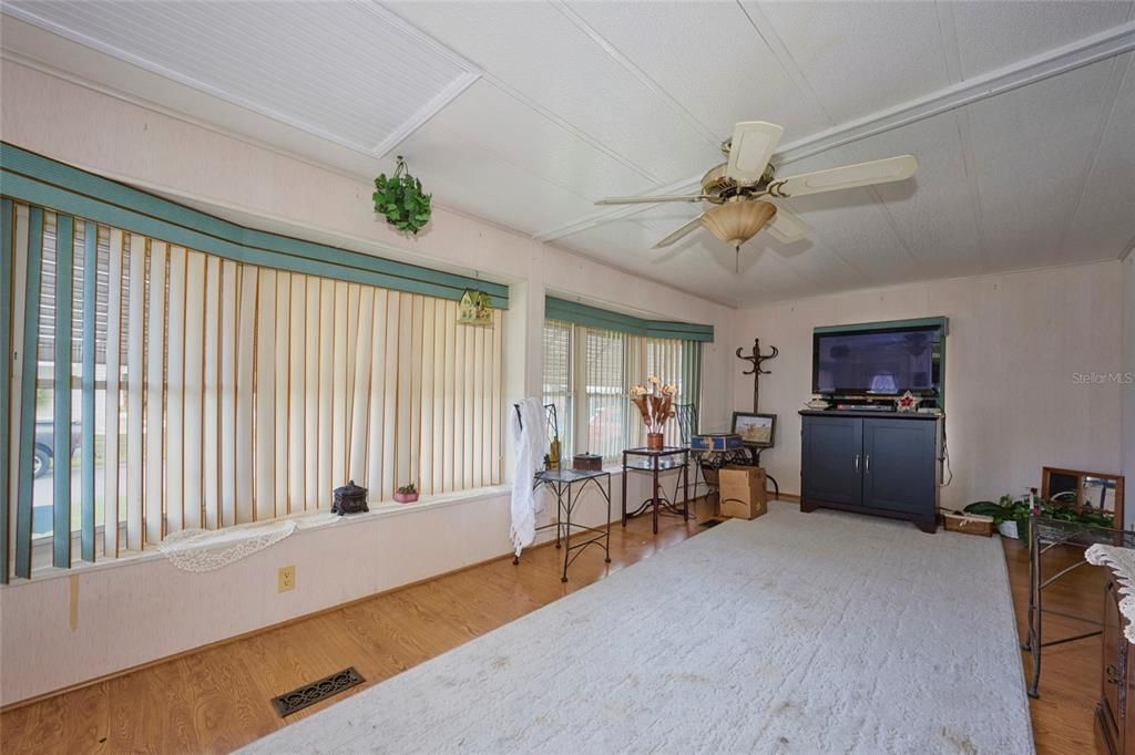 Formal living room offers pleasant natural light