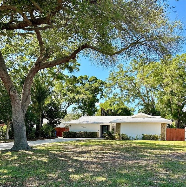 Peaceful setting directly across the street from the 15th Fairway of the St. Petersburg country club, in the Lakewood Estates neighborhood/community