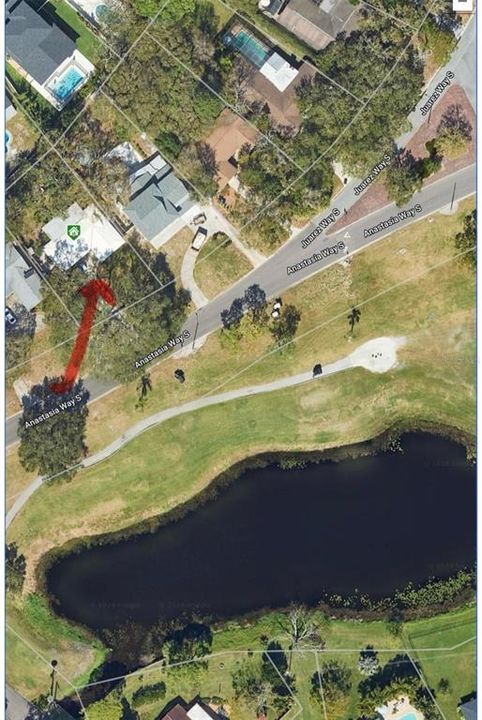 Home is situated along the 15th tee and fairway of the St Petersburg Country Club golf course.