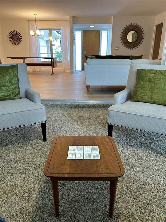 View from Sunroom looking across great room to front door/foyer.