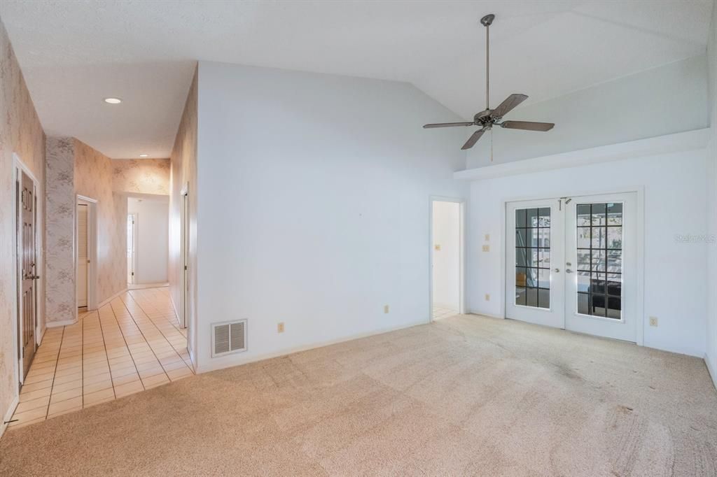 Bonus room just adjacent to the primary bedroom with pool deck access