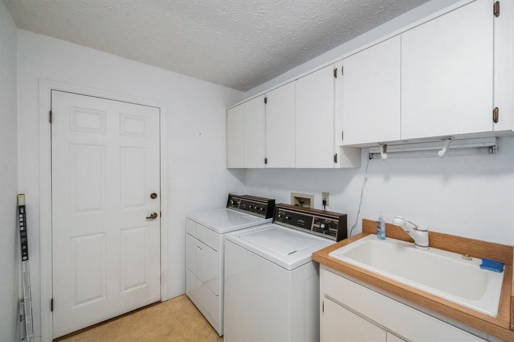 laundry room leads to garage