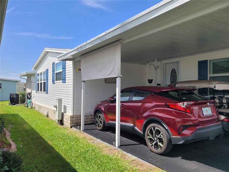 East side w carport and back door